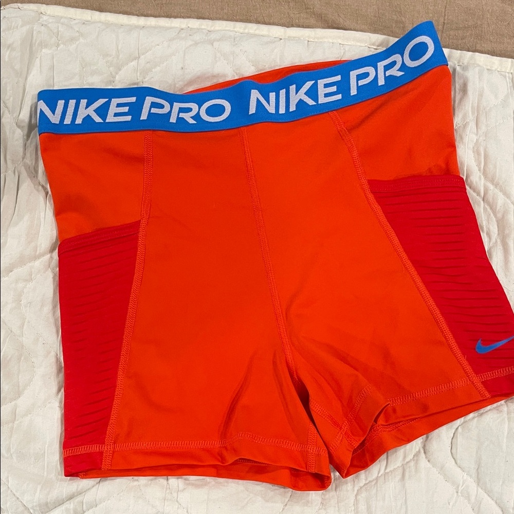 Nike Pro Bright Orange Shorts with Blue Waistband